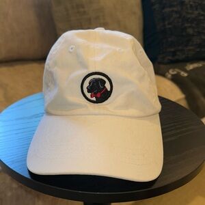 Southern Proper White Cap with black dog